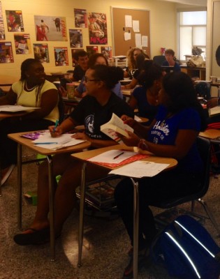 Students in Spanish III with take notes in Janell Gonzalez-Armstrong second period class on Friday.